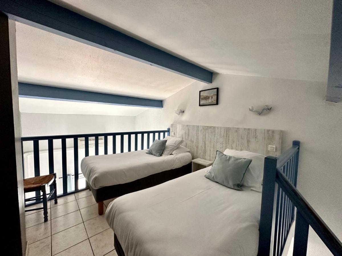 Hotel Les Palmiers En Camargue